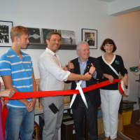 <p>Owner Josh Wright, third from left, joins Fairfield dignitaries at the grand opening of Vinyl Street Cafe.</p>