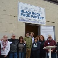 <p>Volunteers serve families each weekend at the Black Rock Food Pantry in Bridgeport.</p>