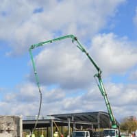 <p>Workers use a crane to construct the new Fairfield Regional Fire Training School.</p>