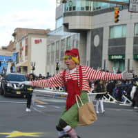 <p>A unicyclist wows the crowd at the Stamford Downtown Parade Spectacular.</p>