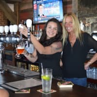 <p>Little Pub bartender Tessa Barzillo and owner Daneen Grabe are all smiles at their new location in Fairfield.</p>