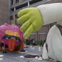 <p>Balloons are deflated at the end of Sunday&#x27;s parade.</p>
