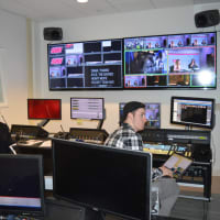 <p>Students at Sacred Heart work in a television studio, where they are learning about how to evaluate messages that come from media.</p>