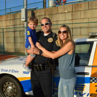 <p>Lt. John Pierotti with his son, Johnny, and wife, Nicole</p>
