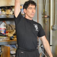 <p>Steve Freides working out with a kettlebell.</p>