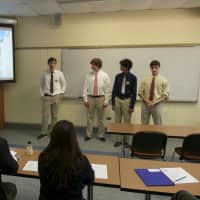 <p>Students present Senior Student Website projects in front of the judges.</p>