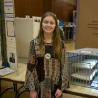 <p>Lena Kufferman of Fairfield shows off her project &#x27;The DNA Encounter.&#x27;</p>