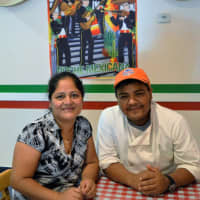 <p>Owners Paula Jimenez and Victor Sanchez in the dining room at Sanchez Mexican Restaurant in Teaneck.</p>