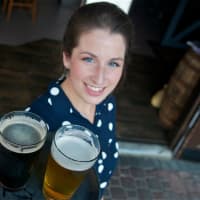 <p>Clock Tower Grill&#x27;s Karen Angley delivers a few cold ones.</p>