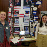 <p>Lizzy Lynch (left) and Kate Williams of Wilton High School with their project &quot;60&#x27;s TV Debates.&quot;</p>