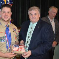 <p>Jeremy Fine received a gift from Fair Lawn PBA #67, presented by David Boone.</p>