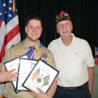 <p>Jack Delaney (right) presented Jeremy Fine with certificates of achievement from the American Legion.</p>
