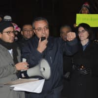 <p>Fairfield University professor Ahmed Ebrahim addresses the crowd at a rally against President Trump&#x27;s executive order on immigration.</p>