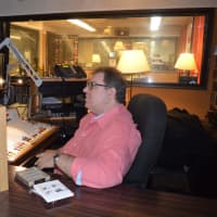 <p>Rob Silber prepares for a Saturday show at WPKN in Bridgeport.</p>