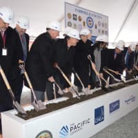 <p>City dignitaries and developers dug their shovels in for a ceremonial ground breaking at Cherry Street Lofts in Bridgeport.</p>