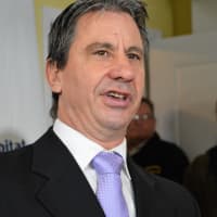 <p>Bergenfield Mayor Norman Schmelz at the ribbon-cutting ceremony for a Habitat Bergen home in the borough.</p>
