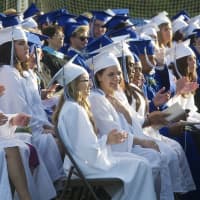 <p>Frank Scott Bunnell High School holds its 56th commencement ceremony Wednesday afternoon, with thousands of people lining the track and filling the bleachers on both sides of the field to view an outdoor ceremony on the football field.</p>
