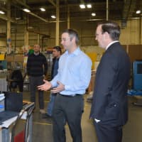 <p>Manufacturing Manager Josh Bauer, left, gives U.S. Sen. Chris Murphy a tour of Lex Products in Shelton.</p>