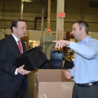 <p>Manufacturing Manager Josh Bauer, right, gives U.S. Sen. Chris Murphy a tour of Lex Products Corp. in Shelton.</p>
