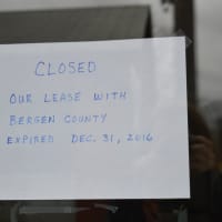 <p>A sign posted on the doorway of the Darlington Golf Center in Mahwah states that the driving range is closed.</p>