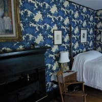 <p>A bedroom in the restored Weir House.</p>
