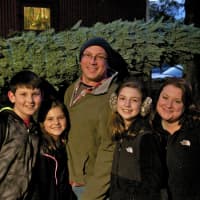 <p>A family comes away with a Christmas tree at Jones Family Farms last year.</p>