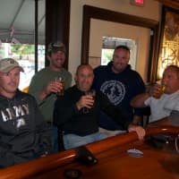 <p>A group of regulars enjoy craft beer at Whistling Willies in Cold Spring.</p>