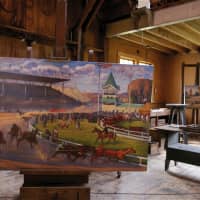<p>This painting of the Danbury Fair is located inside the Young Studio.</p>