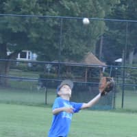 <p>Catching a fly ball.</p>