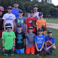 <p>These Ramsey baseball players are to compete in the 11U Little League State Championship. With them are two of their three coaches -- Art Manzo, left back, and Billy Kanwisher, right back.</p>