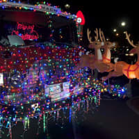 <p>A decorated fire truck brought Santa to Trumbull&#x27;s tree lighting ceremony.</p>