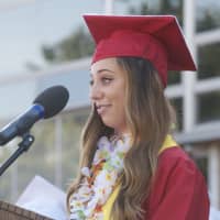 <p>Gabriella Zarlenga gives opening remarks to the crowd at Thursday&#x27;s ceremony.</p>