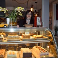 <p>Snezana Milic, owner of Cafe Bubamara in Clifton, shows off some desserts.</p>