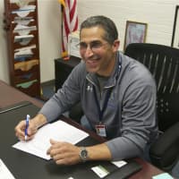 <p>Byram Hills Director of Athletics Rob Castagna in his office.</p>
