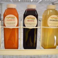<p>SuperJuice drinks in the refrigerator at the Wyckoff store.</p>