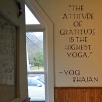 <p>Peering down the &quot;gratitude hallway&quot; at The Body Image Boutique. People are encouraged to write the things for which they&#x27;re thankful on framed boards lining the hall.</p>