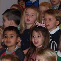 <p>Kids singing during the &quot;Thanksgiving Sing&quot; at Methodist Family Center Preschool in Darien.</p>