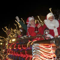 <p>Santa and Mrs. Claus, and the Elves, take a ride to Latham Park.</p>