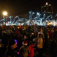 <p>Thousands gathered in downtown Stamford Sunday for Heights &amp; Lights. The crowd at a decorated Latham Park.</p>