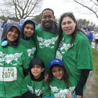 <p>More than 1,900 runners compete in the Sandy Hook 5K in the rain.</p>
