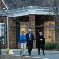 <p>Visitors leave the Kane Funeral Home in Ridgefield.</p>