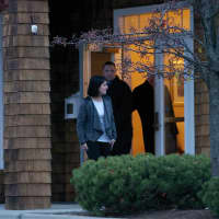 <p>Visitors leave the Kane Funeral Home in Ridgefield. </p>
