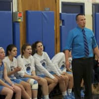 <p>Mounties coach Rich Burger and the Suffern bench watch the action.</p>