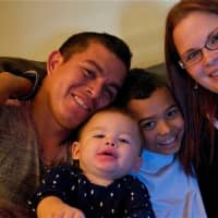 <p>Brittany and Rolando Gregorio with sons Adam (L) and Jayden, who inspired mom to start Glow Jars by Britt.</p>