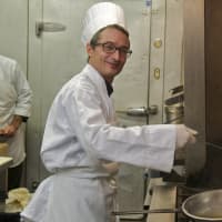 <p>A chef at work at the newly-opened Amore Ristorante Pizzeria in Mahopac.</p>