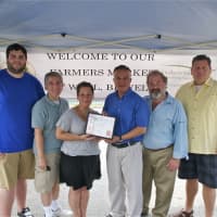 <p>Daily Voice Managing Editor Joe Lombardi (third from R) presents DVlicious first-place certificate to (from L): Nico Amatuli,  Edwin Alvarez, Melissa Kamin, Howard Yager and Paul Jonke.</p>