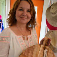 <p>Pam Greenberg holding a Provencal serving board.</p>