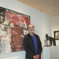 <p>Robert Alberetti, of New Fairfield, with one of his paintings.</p>
