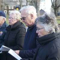<p>A small group gathers Saturday to bless a new creche at the Monroe Town Green.</p>