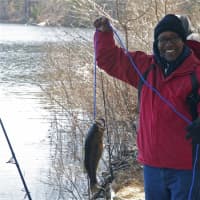 <p>Celebrating the first catch of the day near the Saugatuck Reservoir in Redding, as Fairfield County fishermen come out Sunday for the opening weekend of the trout fishing season.</p>